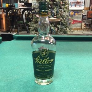 Empty Weller Reserve whiskey bottle